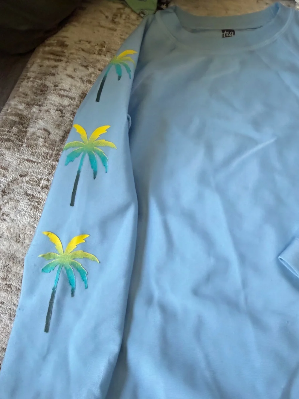 4T - Tea Collection Light Blue Rashguard Top with Tropical Palm Print